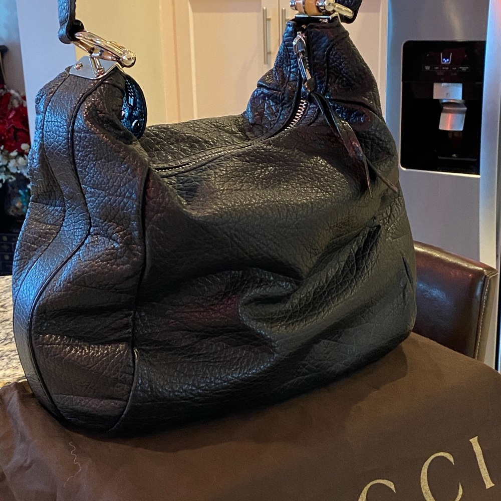 Gucci Hobo. Lovingly used. Black pebbled leather.